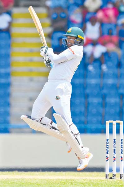 Shakib Al Hasan, of Bangladesh, hits 4 during the third day of the 1st Test between Bangladesh and West Indies at Vivian Richards Cricket Stadium in North Sound, Antigua and Barbuda, on June 18, 2022.	photo: AFP 