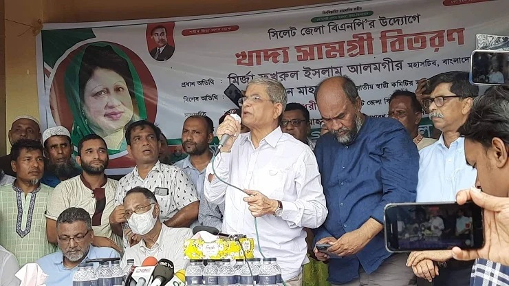 BNP Secretary General Mirza Fakhrul Islam Alamgir speaking while distributing relief materials among the flood-affected people on Khazar Mokam High School premises under Jaintapur upazila in Sylhet on Thursday (June 22, 2022)