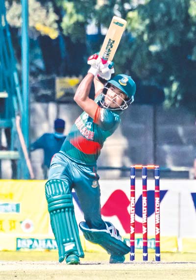 Bangladesh's Afif Hossain plays a shot during the third one-day international (ODI) cricket match between Zimbabwe and Bangladesh at the Harare Sports Club on August 10, 2022. photo: AFP