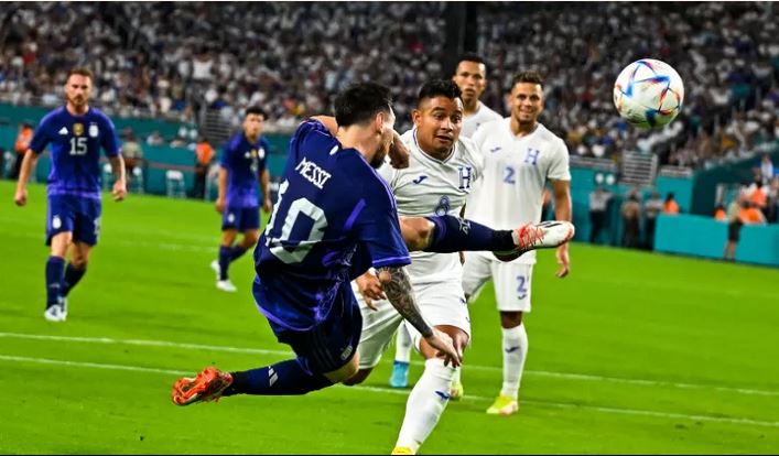 Messi kicks the ball during the international friendly match between Honduras and Argentina at Hard Rock Stadium in Miami Gardens, Florida.