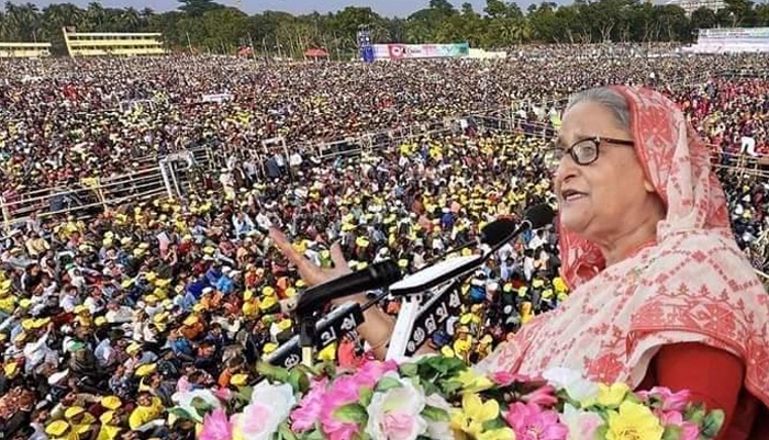 Prime Minister Sheikh Hasina addresses a public rally at Shams-ul-Huda Stadium in Jashore on Thursday.