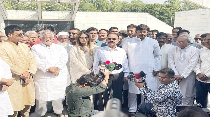BNP standing committee member Gayeshwar Chandra Roy speaks to reporters after paying tributes to the graveyard of party founder Ziaur Rahman along with Khandker Abu Ashfaque and Nipun Roy Chowdhury, president and general secretary of the newly appointed committee of Dhaka District BNP on Thursday.