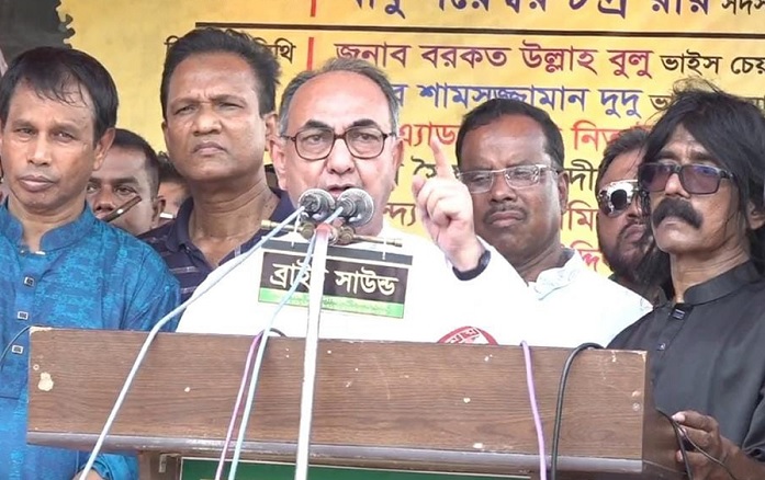  BNP Standing Committee member Mirza Abbas on Tuesday addressing a road march programme of the party at Jhenaidah bus terminal.