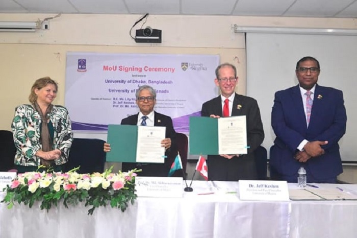 Dhaka University Vice-Chancellor Professor Dr Md Akhtaruzzaman (2nd from left) and President and VC of the University of Regina Professor Dr Jeff Keshen (2nd from right) signed a MoU on behalf of their respective universities on academic collaboration on Tuesday (October 3, 2023) at at Professor Abdul Matin Chowdhury Virtual Classroom of the DU. Canadian High Commissioner to Bangladesh Lilly Nicholls looks on.
