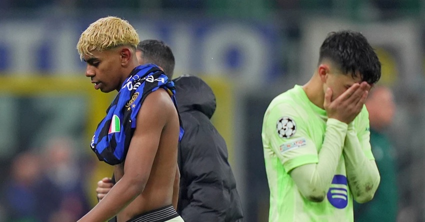 Barcelona's Lamine Yamal, left, reacts after the Champions League semifinal second leg soccer match between Inter Milan and Barcelona at San Siro stadium in Milan , Italy, Tuesday, May 6, 2025. Photo: AP